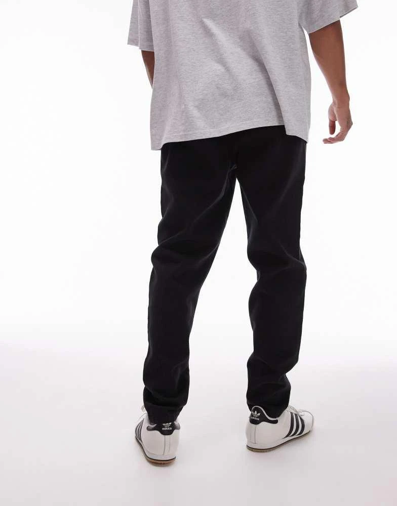 Topman Topman tapered trousers with elasticated waistband in black 4