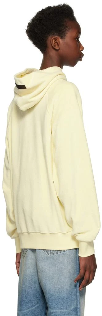 Fear of God ESSENTIALS Yellow Raglan Hoodie 3