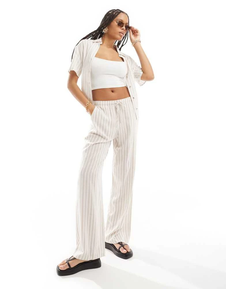 Stradivarius Stradivarius co-ord linen look pull on trousers in beige stripe 1