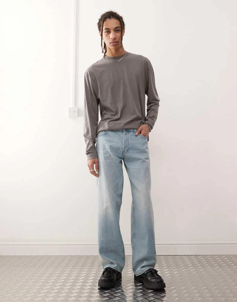 Weekday Weekday Sphere low waist wide leg jeans in light blue wash 1