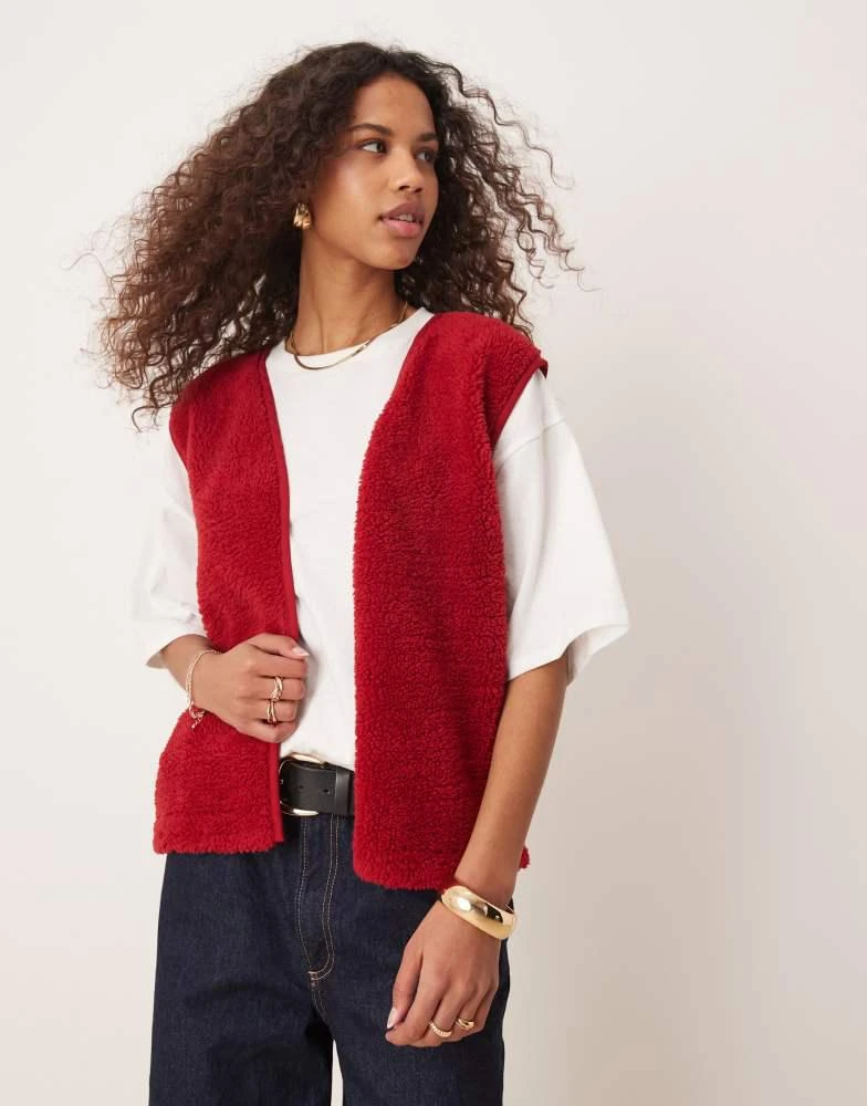 ASOS ASOS DESIGN borg gilet with binding in red 1