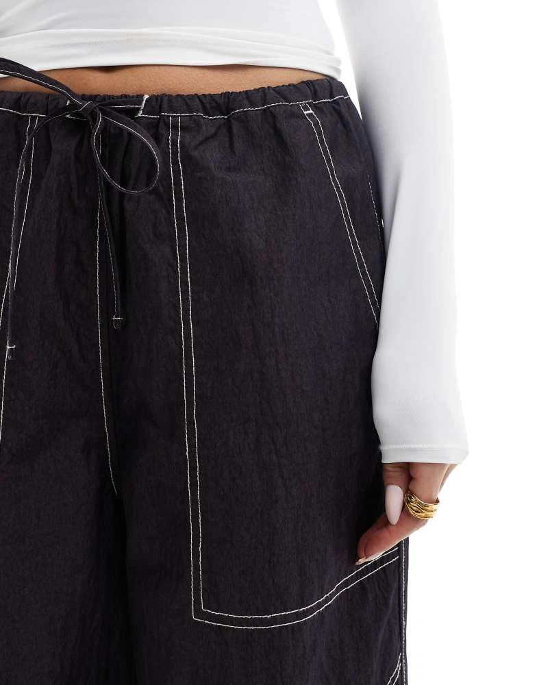 ASOS ASOS DESIGN wide leg trouser with tie hem and pocket detail in navy crinkle 5