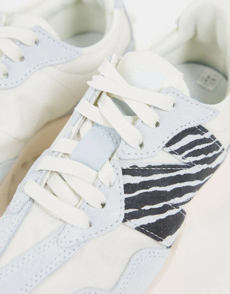 New Balance New Balance 327 trainers in pastel blue and zebra 2