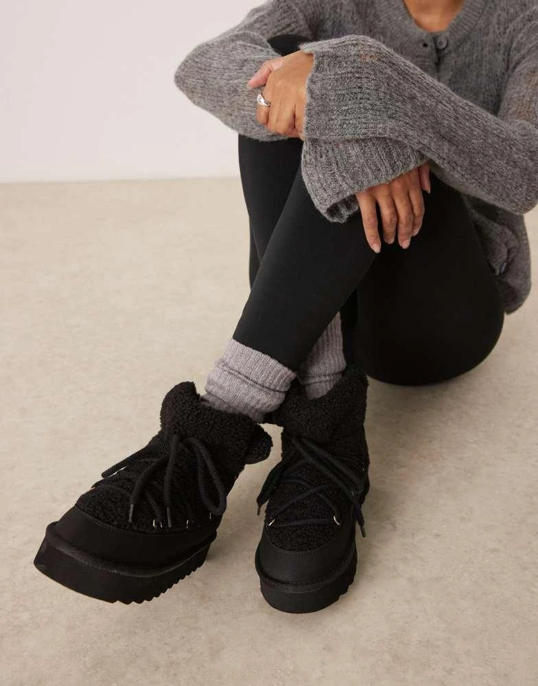 New Look New Look suedette snow boot in black 1