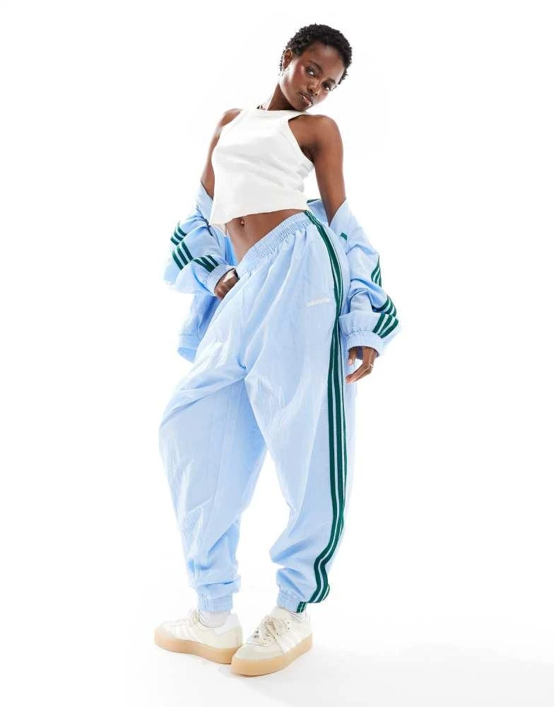 Adidas adidas Originals 80s track pant in blue 1