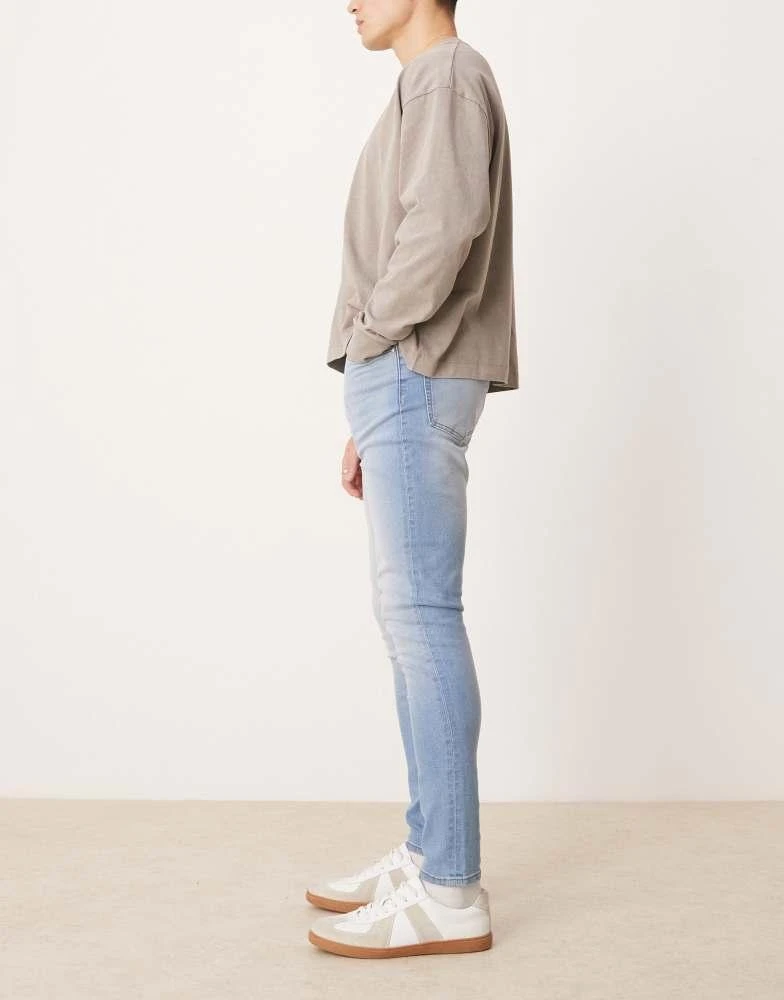 ASOS ASOS DESIGN power stretch jeans in light wash 3