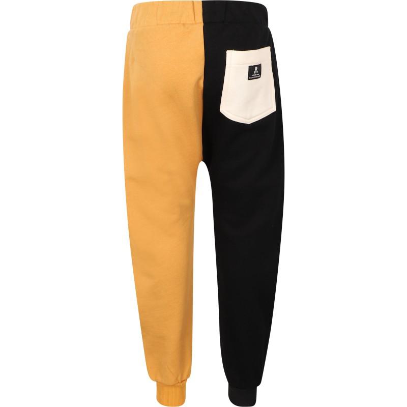 Rock Your Baby Easy tiger sweatpants in two toned color black and mustard