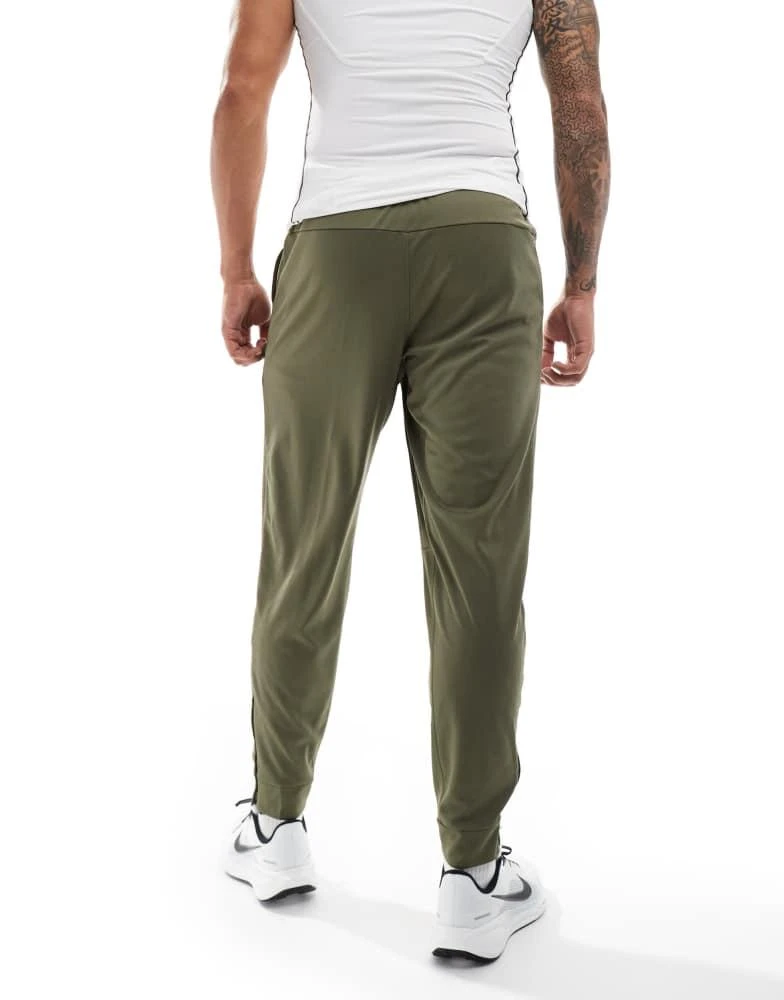 NIKE Nike Training Totality joggers in khaki 3