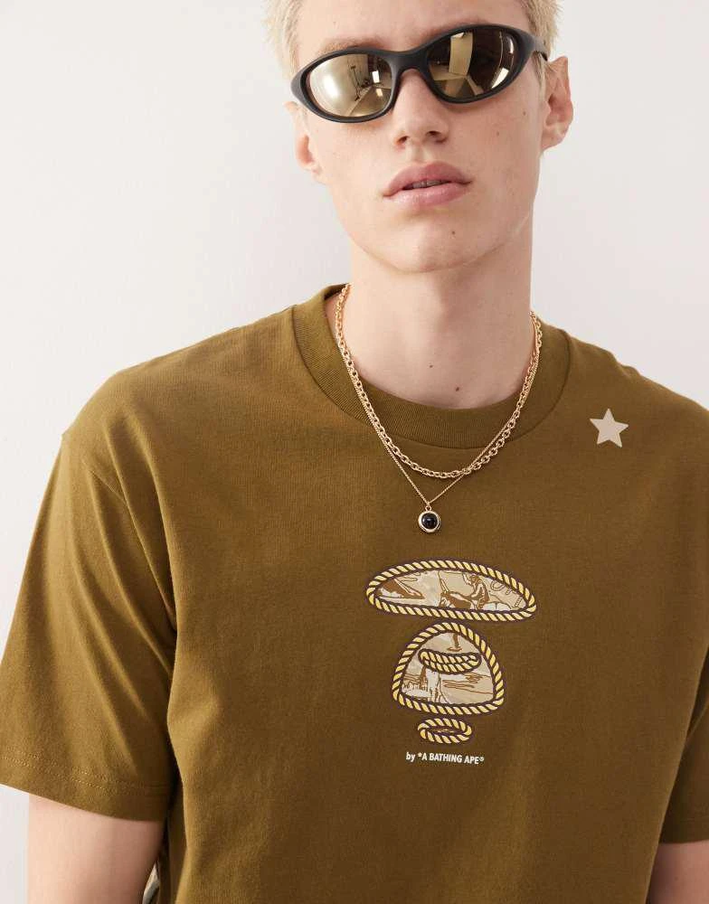 AAPE Aape by A Bathing Ape boxy fit t-shirt in khaki green with multi placement western print 3