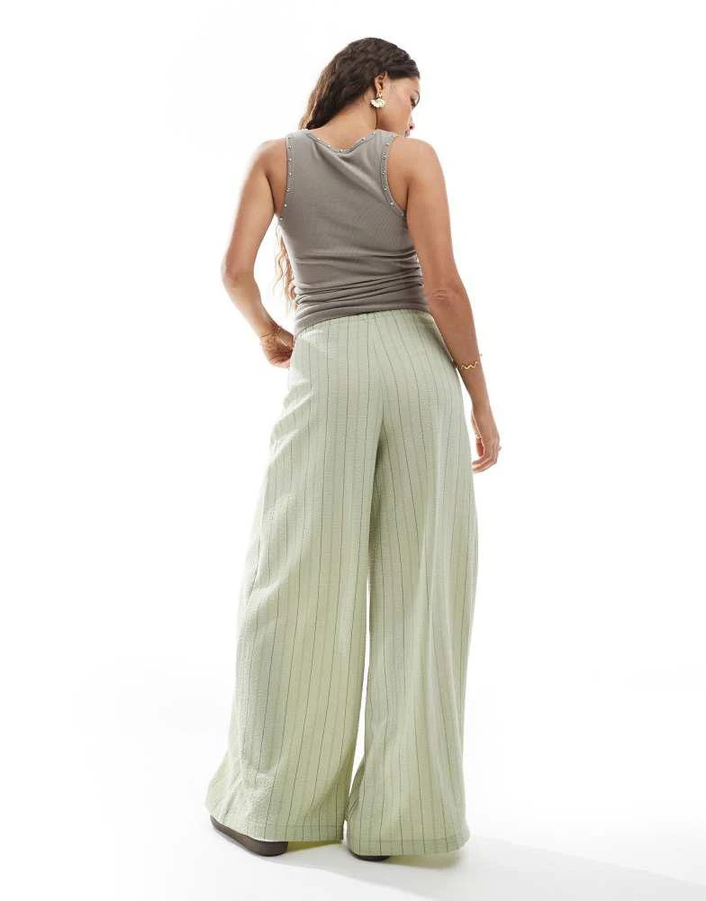 Stradivarius Stradivarius Petite linen look wide leg trouser in khaki stripe 4