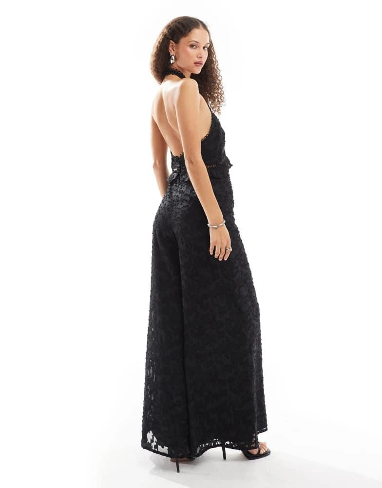 ASOS ASOS DESIGN jacquard halter wide leg jumpsuit in black 3
