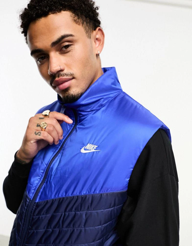 NIKE Nike Windrunner midweight padded gilet in navy 4