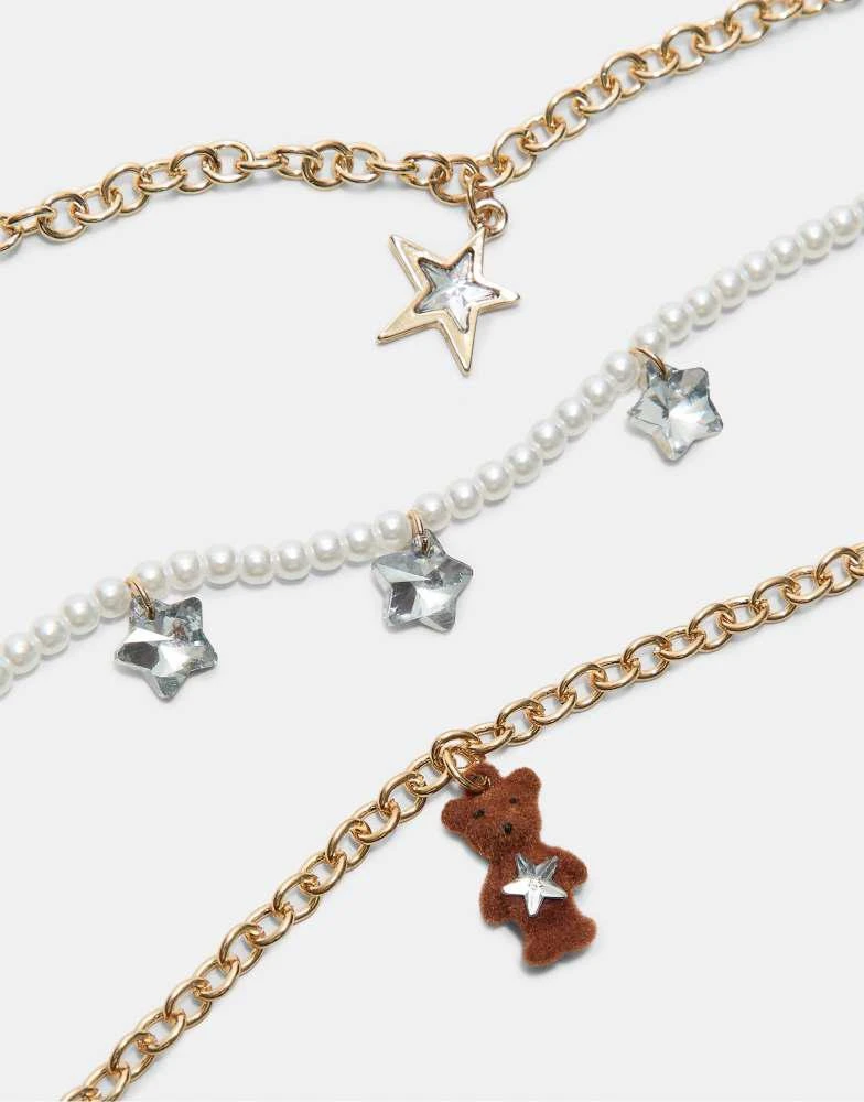 Stradivarius Stradivarius Set of 3 teddy bear necklaces in gold 2