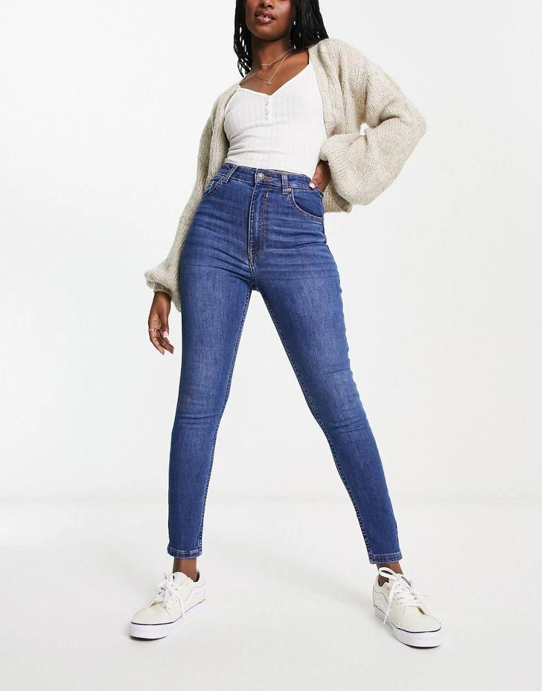 Bershka Bershka high waist ankle length skinny jean in mid blue 1