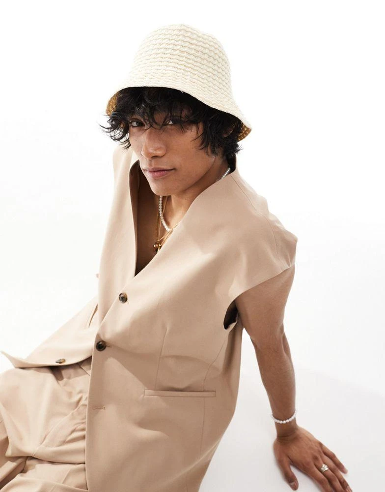 ASOS ASOS DESIGN knitted bucket hat in ecru 1