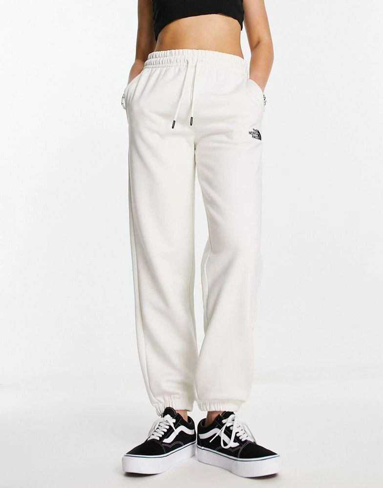 The North Face The North Face Essential oversized joggers in cream Exclusive at ASOS 2