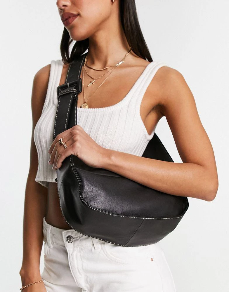 ASOS ASOS DESIGN leather curved base crossbody sling bag with contrast stitch in black 3