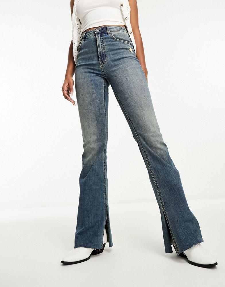 Stradivarius Stradivarius flare jean with split in dark vintage wash