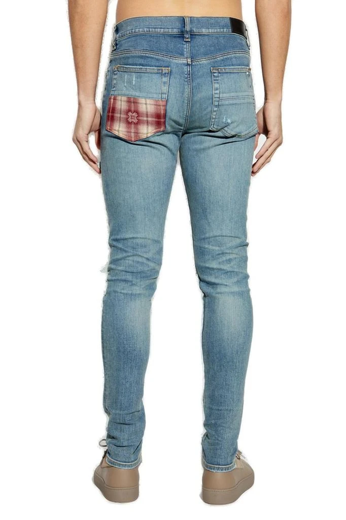 AMIRI Amiri Distressed Skinny Jeans 3