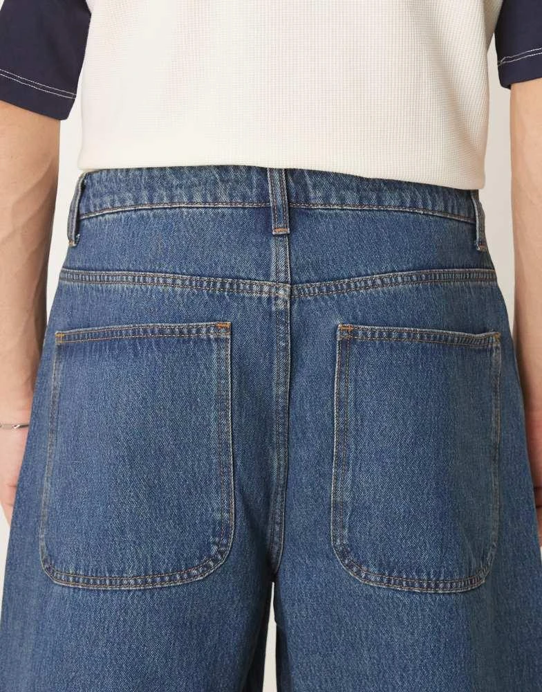 ASOS ASOS DESIGN super baggy jeans with twisted seams in mid wash blue 4
