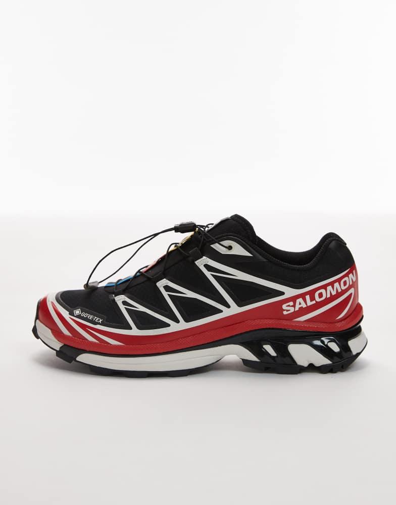 Shop Salomon XT-6 GTX trainers in black and flame scarlet and