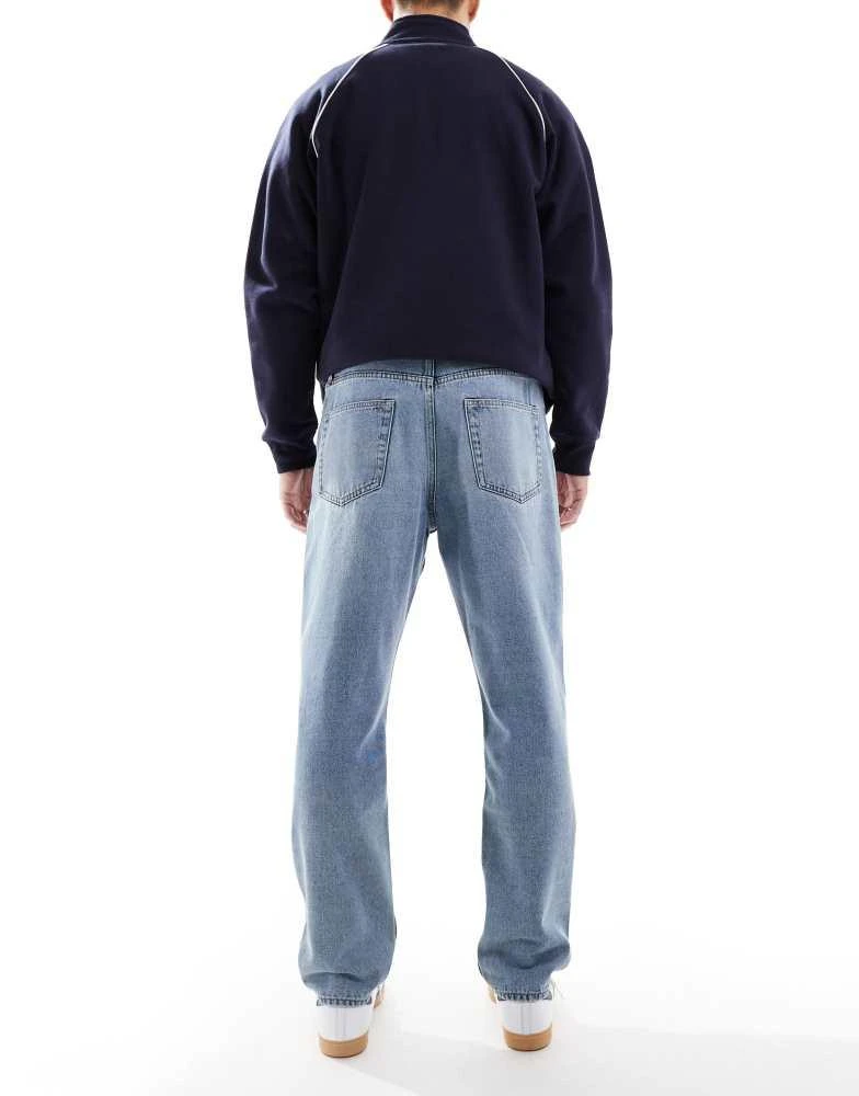 Only
Sons ONLY
SONS loose tapered jeans in light blue wash 3