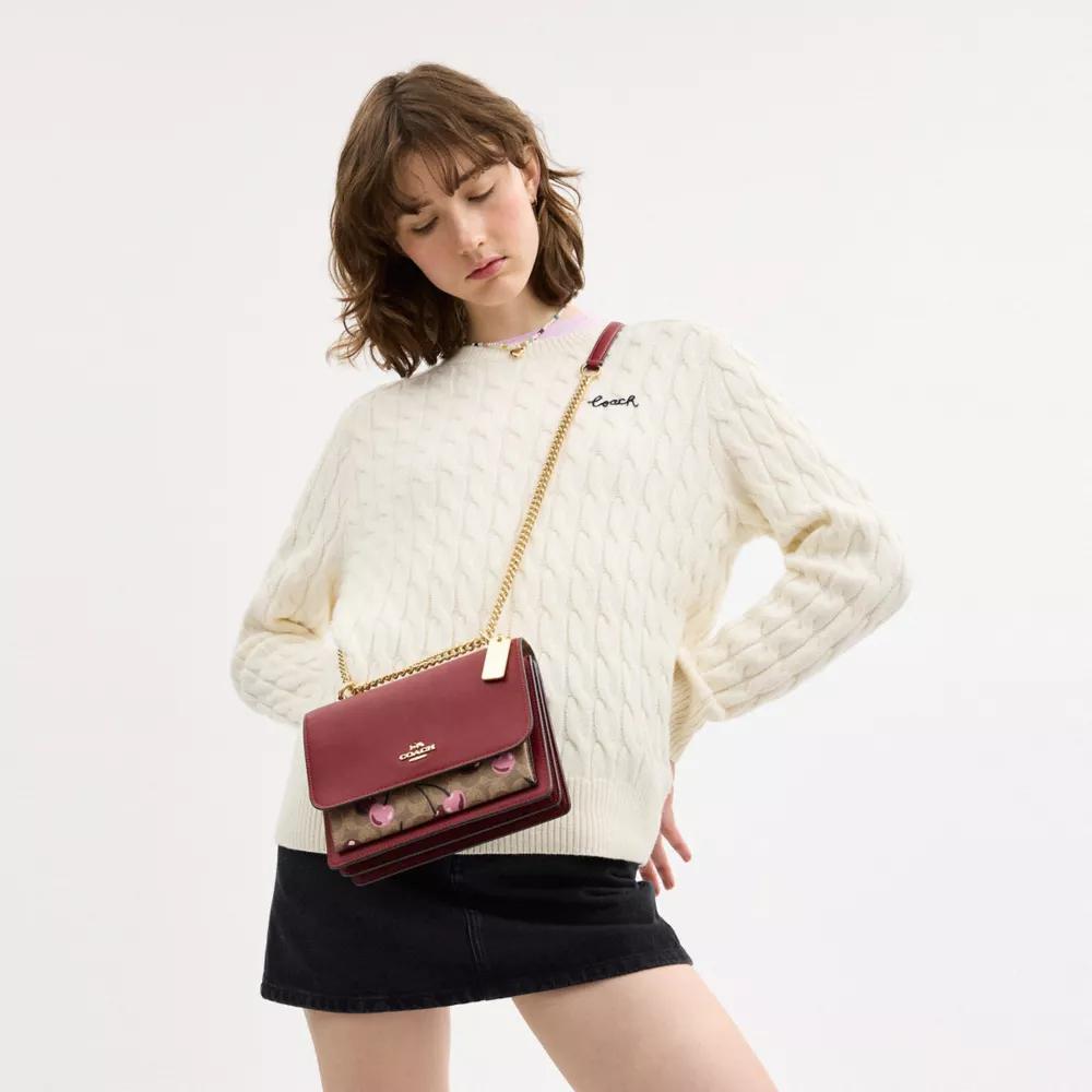 undefined Klare Crossbody Bag In Signature Canvas With Cherry Print