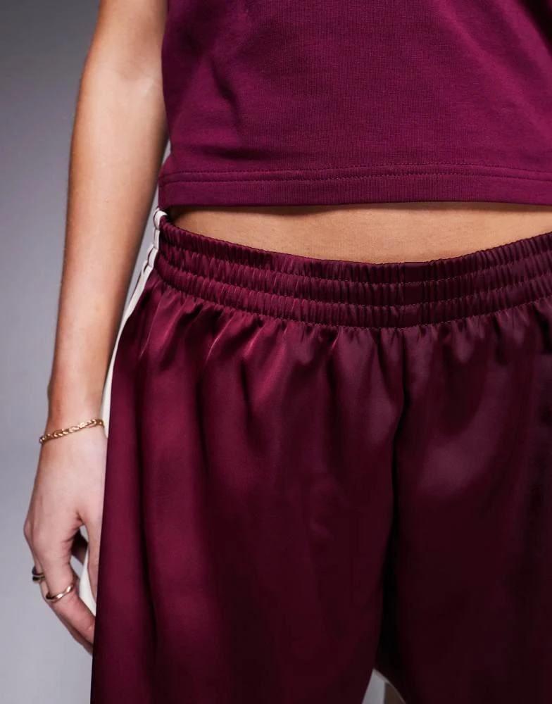 Adidas adidas Originals three stripe sprinter shorts in maroon 5