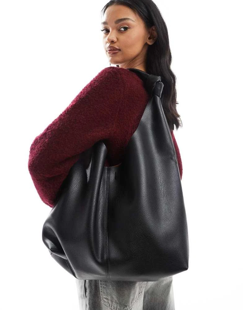 Stradivarius Stradivarius knot detail shoulder bag in black 1
