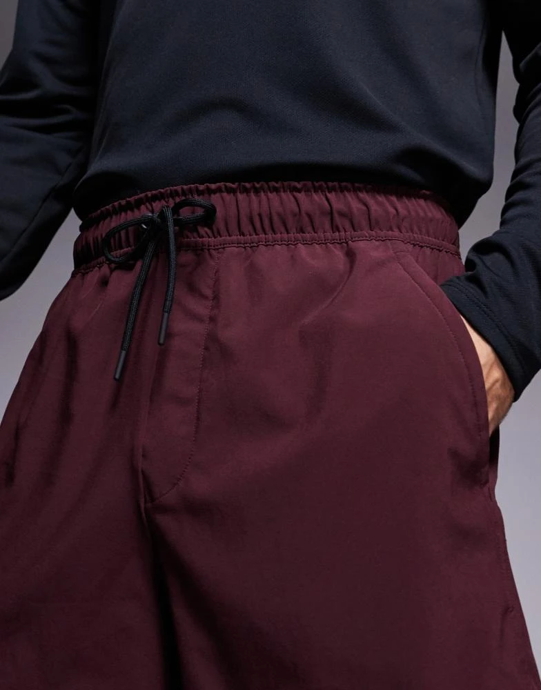 NIKE Nike Training Dri-Fit Unlimited woven 7 inch shorts in burgundy 4