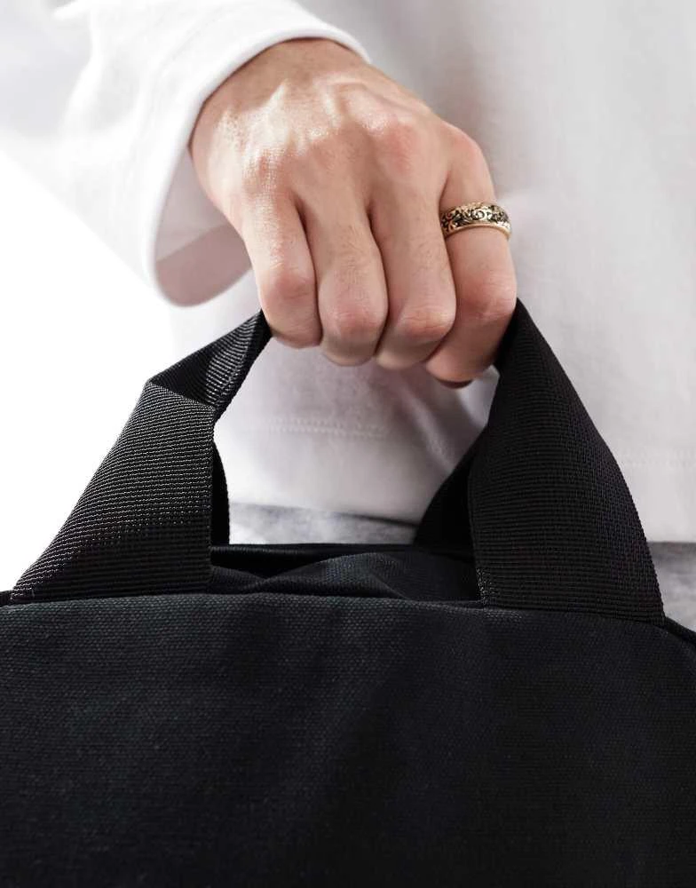 ASOS ASOS DESIGN square canvas backpack in black 4