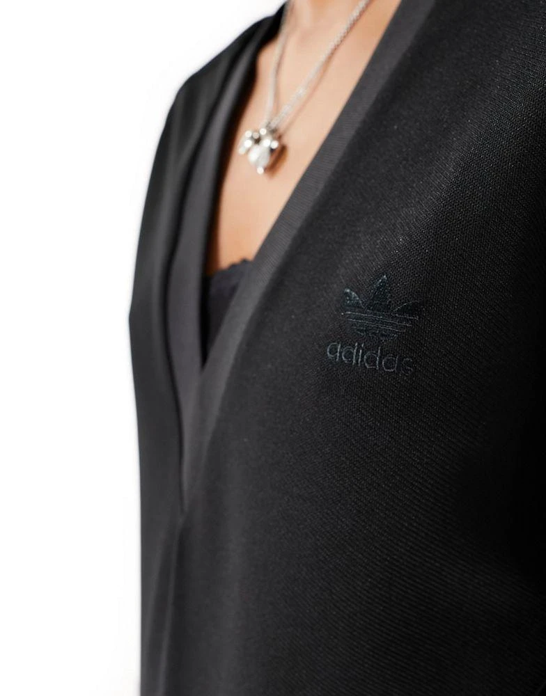 Adidas adidas Originals Dark Varsity jumpsuit in black with lace details 3
