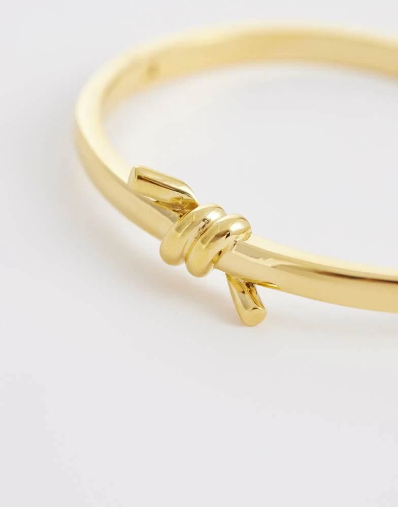 Abbott Lyon Abbott Lyon twisted knot bangle in 18k plated stainless steel in gold 3