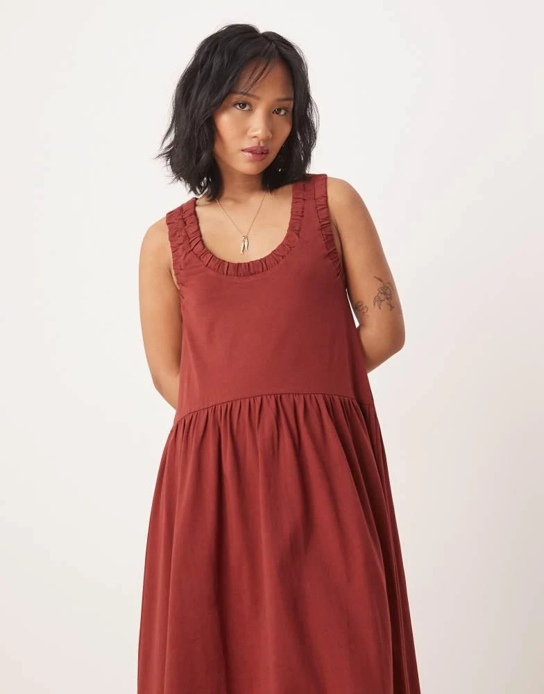 Shop ASOS DESIGN Petite ruched scoop smock midi dress in rust on