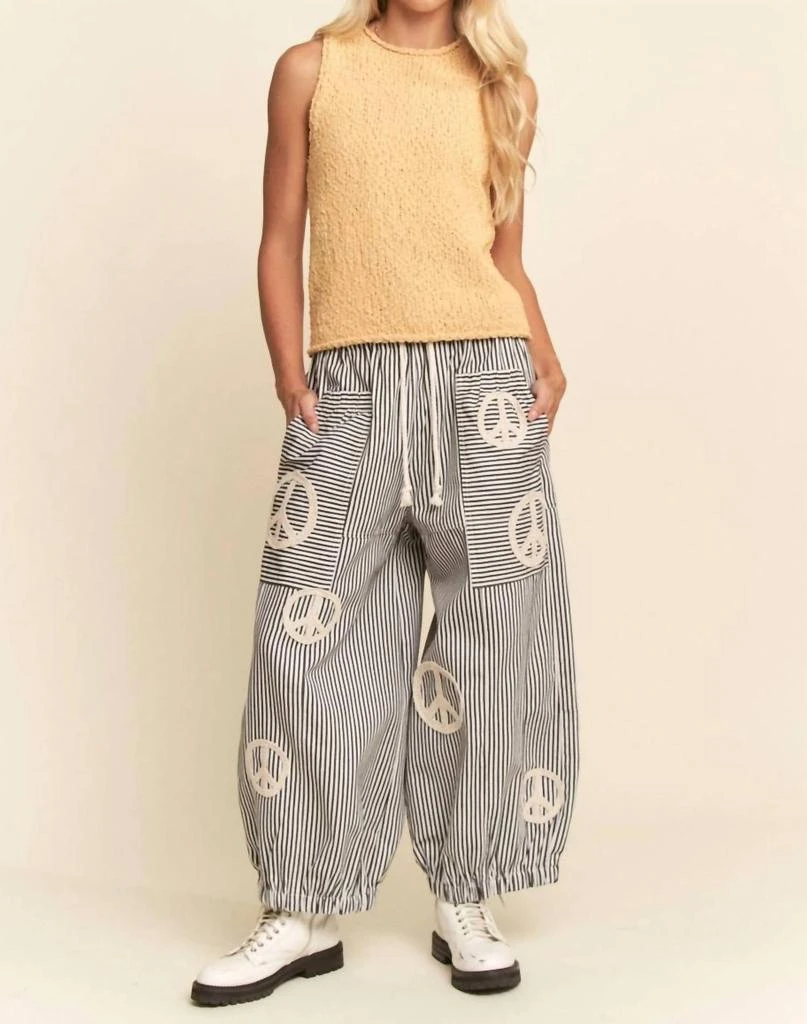 DAVI 
DANI Davi 
Dani - Peace Sign Pinstripe Palazzo Pants 4