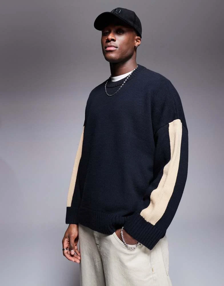 Shop ASOS DESIGN super oversized crew neck knitted jumper with arm
