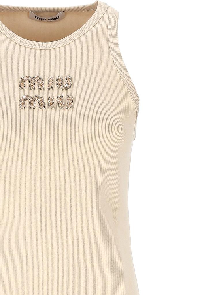 miumiu 2024 新作 ロゴ レイヤード ノースリーブカットソー タグつき 首もとのタグがポイント。ミュウミュウの最新レイヤードスタイル