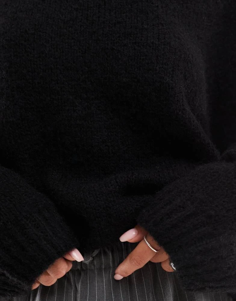 ASOS ASOS DESIGN oversized crew neck jumper in black 4