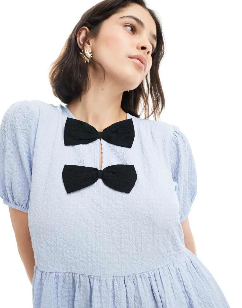 New Look New Look bow front mini dress in light blue 3