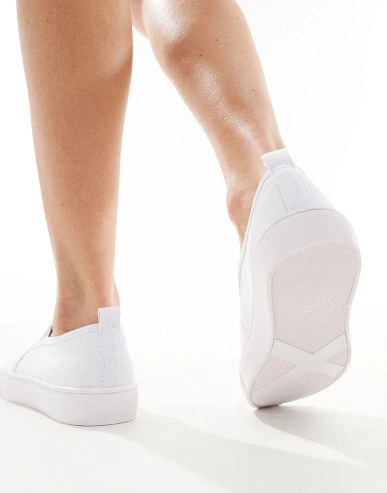 ASOS ASOS DESIGN Dotty slip on plimsolls in white 4