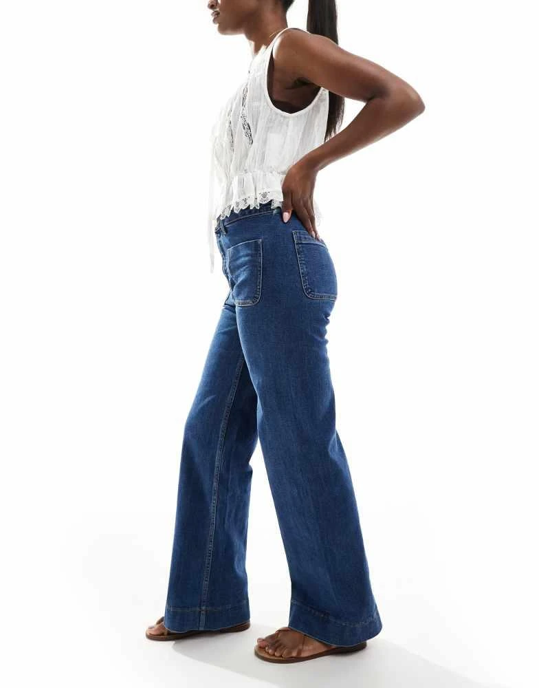Bershka Bershka high waisted pocket detail jeans in mid wash 2