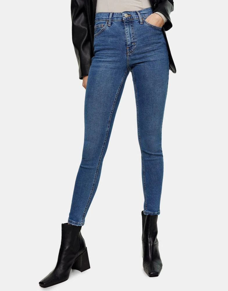 Topshop Topshop Jamie jeans with abraided hem detailing in mid blue  1