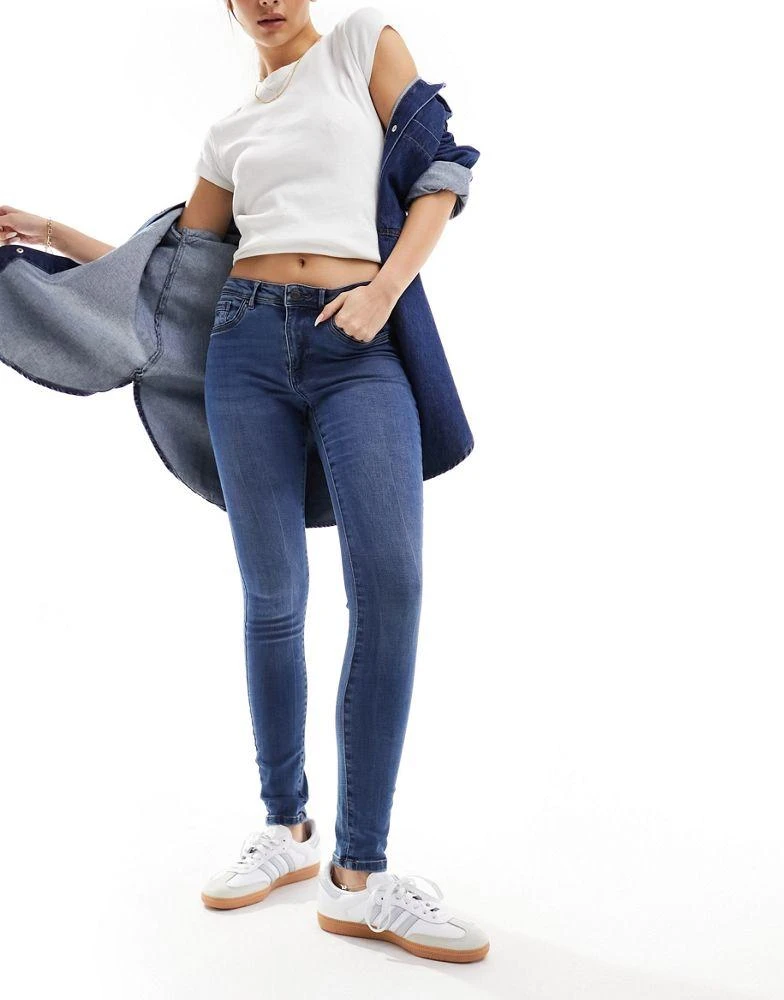 VERO MODA Vero Moda Tanya mid rise skinny jeans in medium blue wash 1