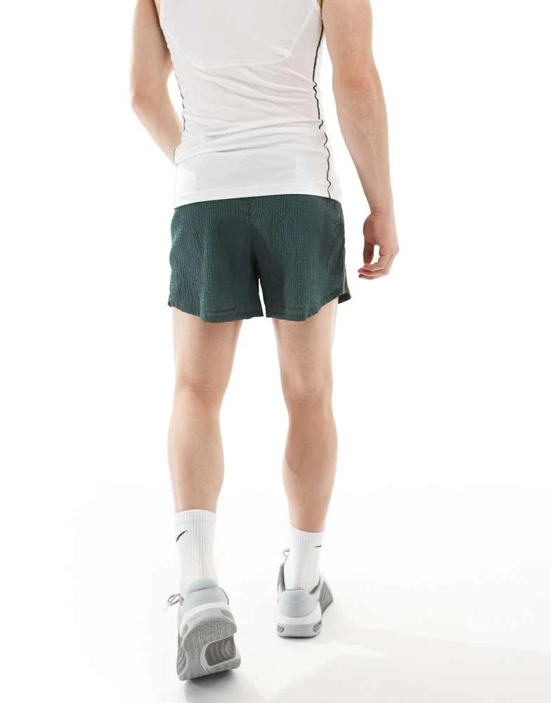 NIKE Nike Running Run Division 5 inch shorts in dark green 5