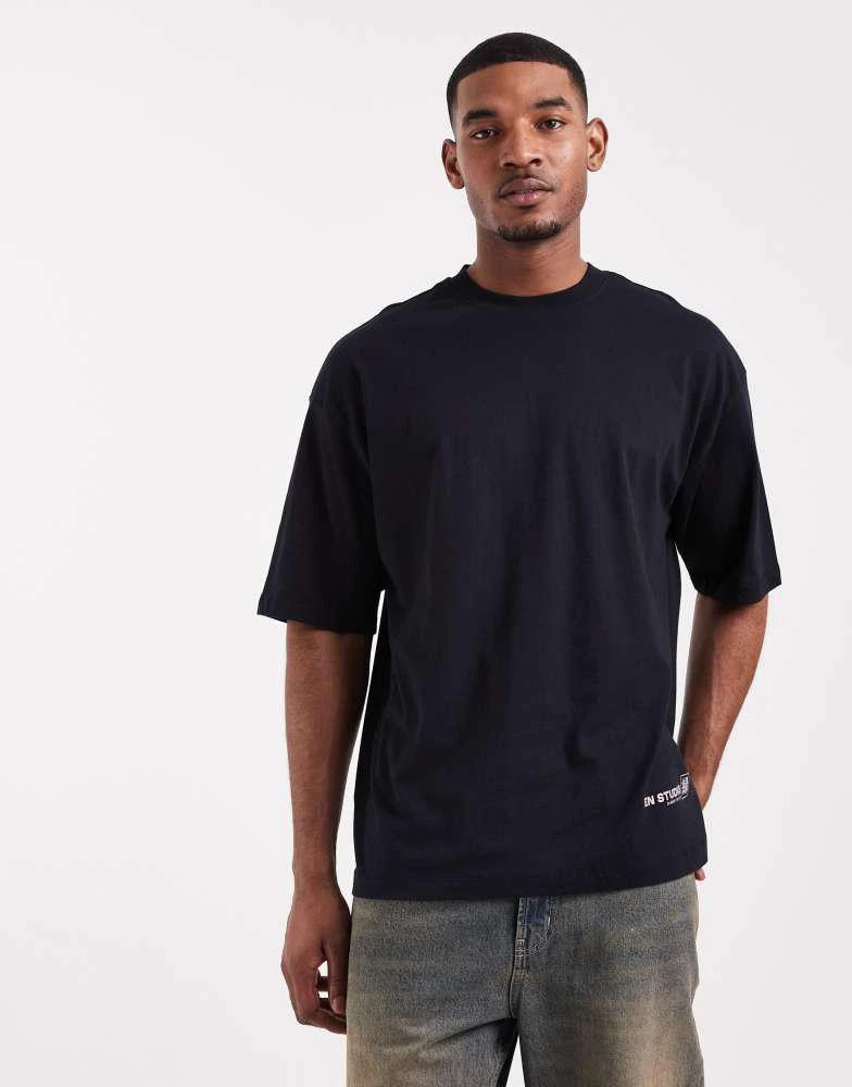 ASOS ASOS DESIGN oversized t-shirt with souvenir graphic in black 5