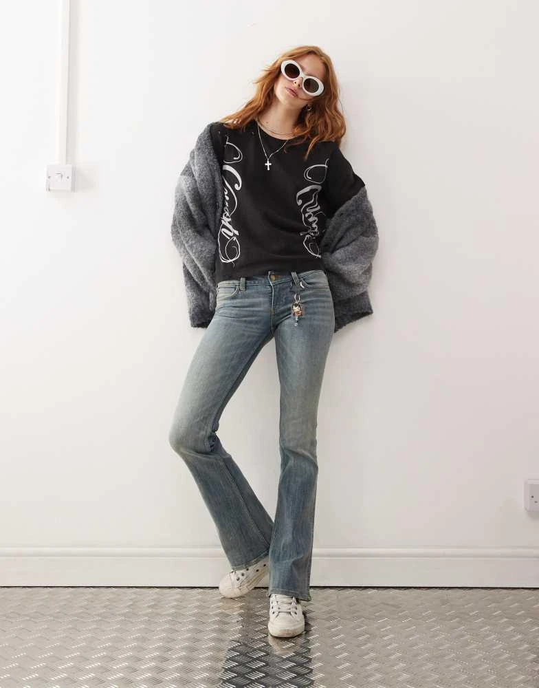 Cheap Monday Cheap Monday Booty Bei stretch low rise bootcut jeans in puddly blue tinted wash 1
