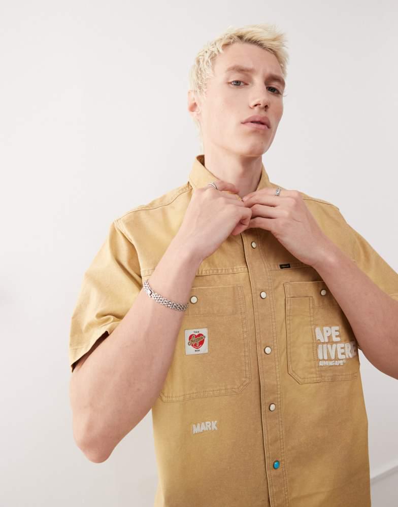 AAPE Aape by A Bathing Ape worker short sleeve shirt in beige with back embroidery