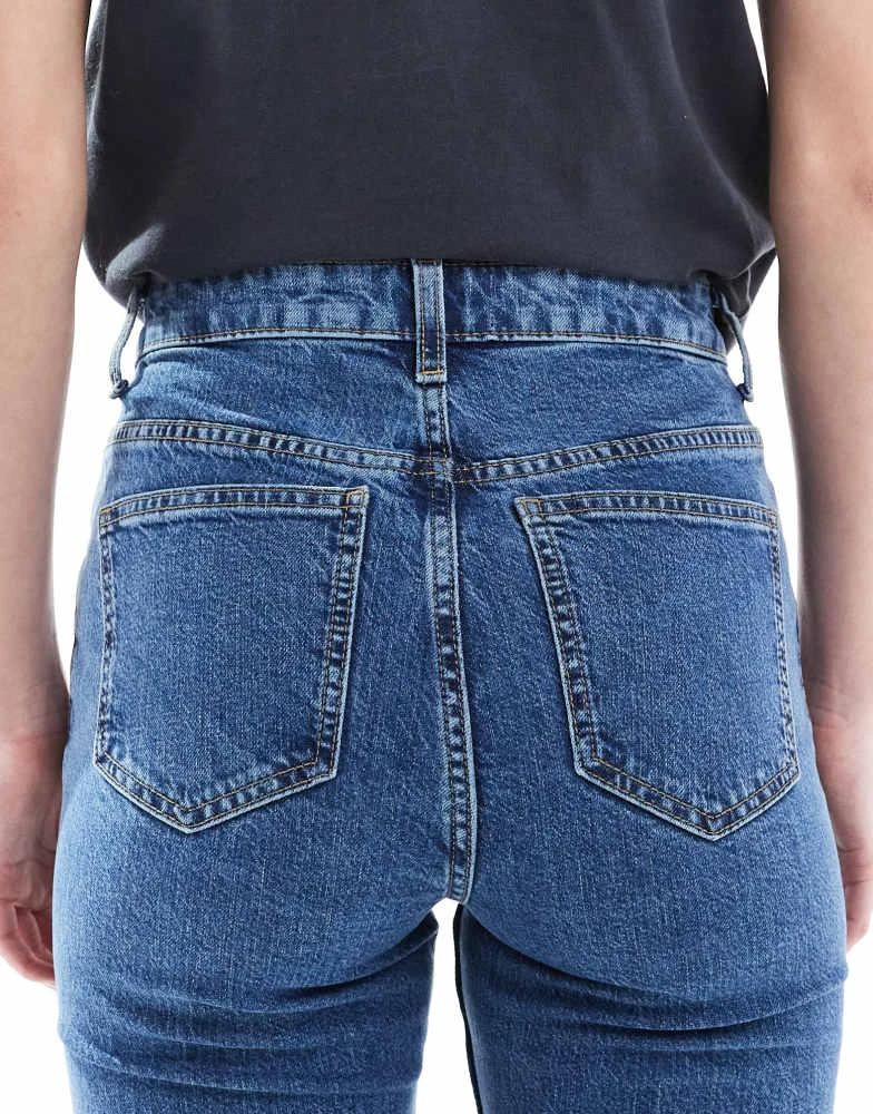 ASOS ASOS DESIGN Tall mid rise flare jeans in authentic dark midwash 4