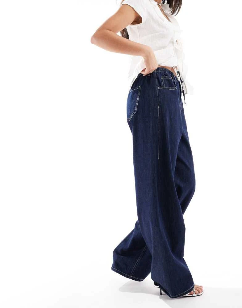 Bershka Bershka drawstring waist wide leg jeans in indigo wash 1
