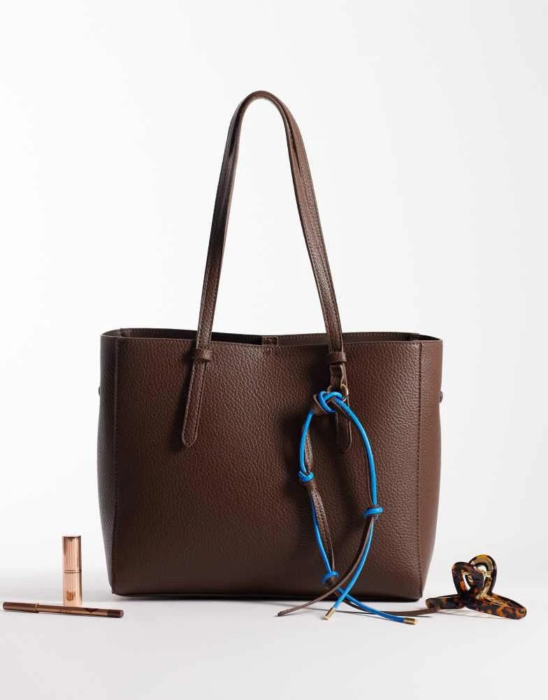 ASOS ASOS DESIGN textured multi compartment tote bag with detachable bag charm in chocolate 2